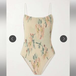 Totême 
Shirred floral-print recycled swimsuit
Size M